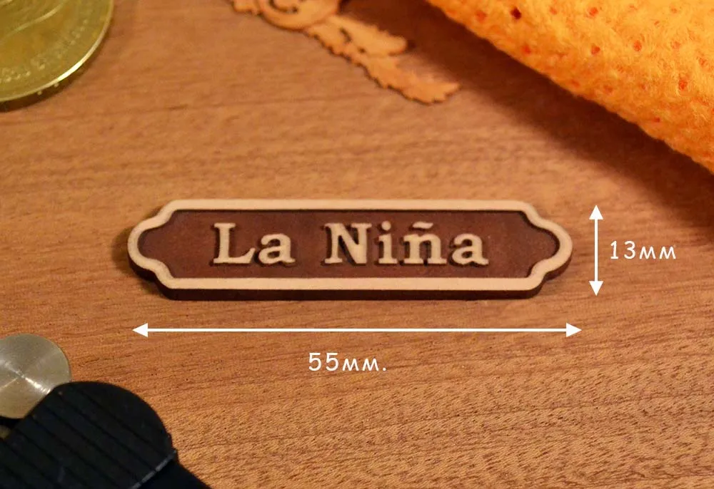 Темная табличка La Nina, груша, рез ЧПУ