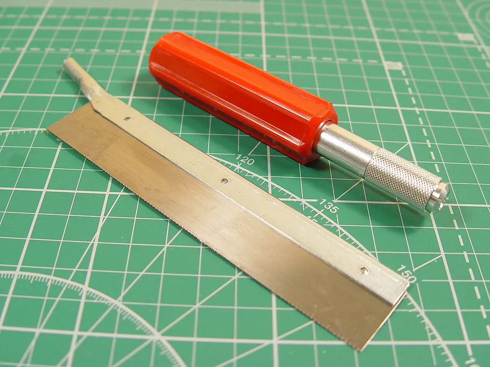 Пилка, 42 зубца/дюйм (16,5 зубцов/см) Пилка, 42 зубца/дюйм (16,5 зубцов/см)