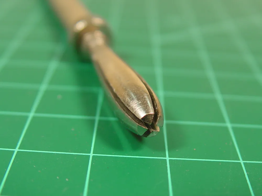 Двухсторонняя минидрель со скользящим зажимом