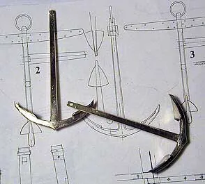 Остается только сделать из дерева шток, бугели штока и якорный рым